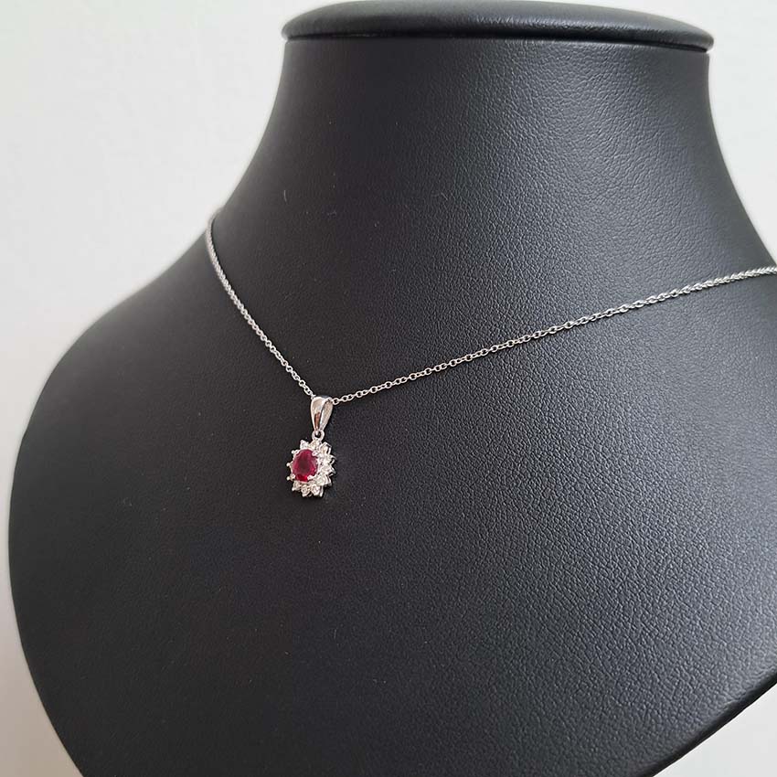 0.62ct Oval Ruby and Diamond Cluster Pendant with Chain