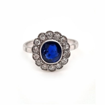 Vintage sapphire and diamond cluster engagement ring in 18ct white gold