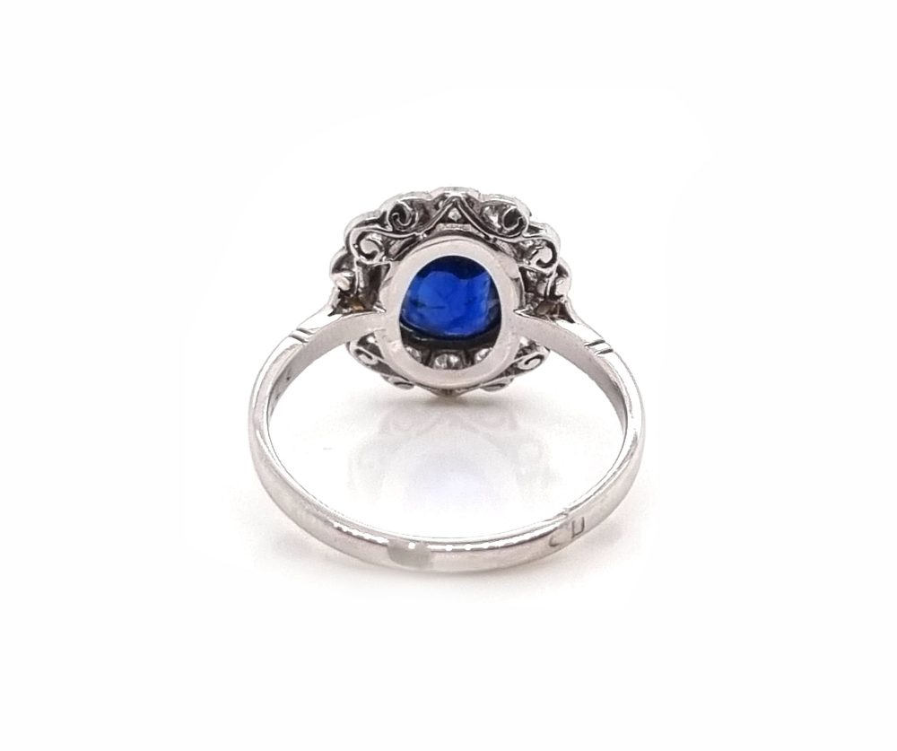 Vintage sapphire and diamond cluster engagement ring in 18ct white gold