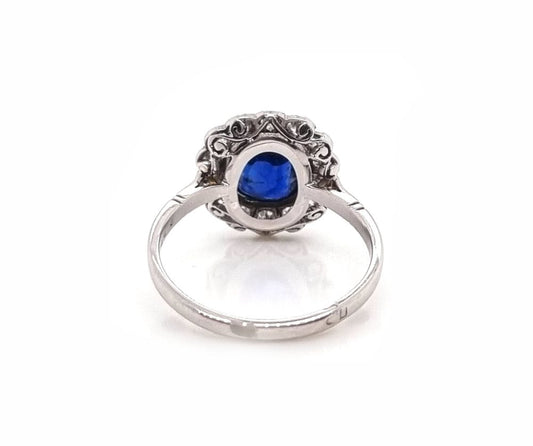 Vintage sapphire and diamond cluster engagement ring in 18ct white gold