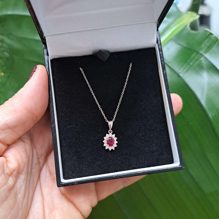 0.62ct Oval Ruby and Diamond Cluster Pendant with Chain