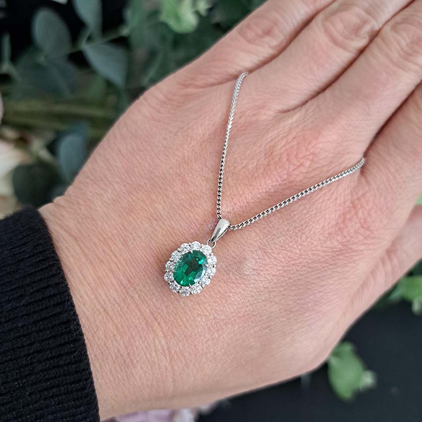 1.66ct Oval Emerald and Diamond Cluster Pendant with Chain
