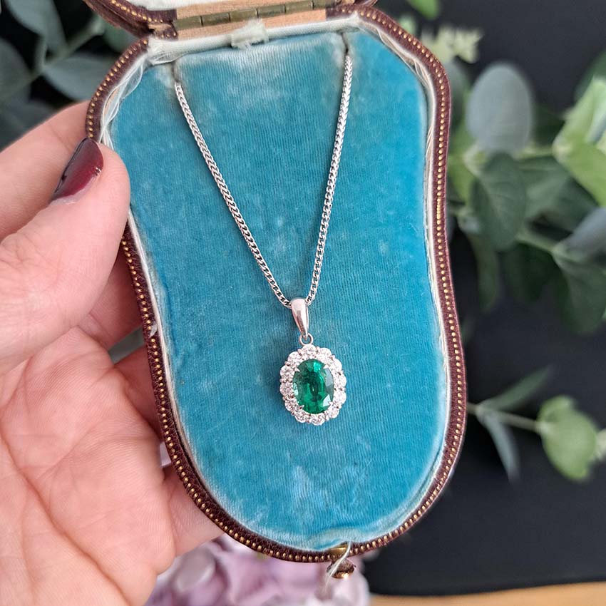1.66ct Oval Emerald and Diamond Cluster Pendant with Chain
