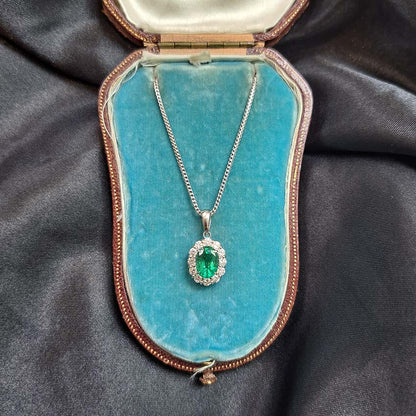 1.66ct Oval Emerald and Diamond Cluster Pendant with Chain