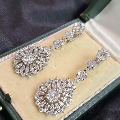 6ct Diamond Pear Shaped Cluster Drop Earrings, 6 carats of sparkling round brilliant-cut diamonds arranged in teardrop shaped drops accented with marquise shaped surrounds in 18ct white gold