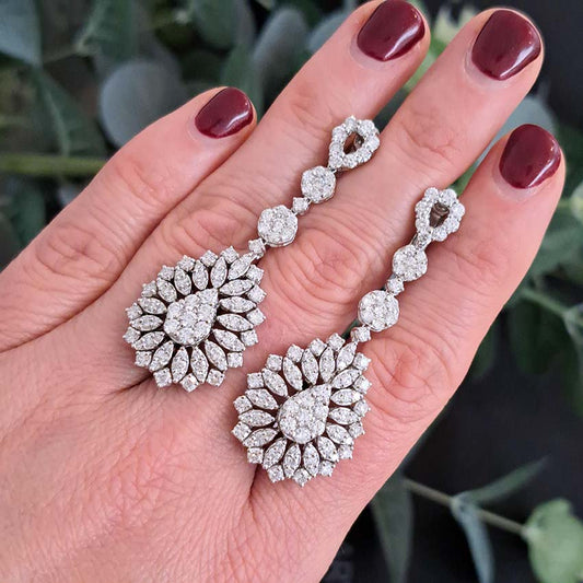 6ct Diamond Pear Shaped Cluster Drop Earrings, 6 carats of sparkling round brilliant-cut diamonds arranged in teardrop shaped drops accented with marquise shaped surrounds in 18ct white gold