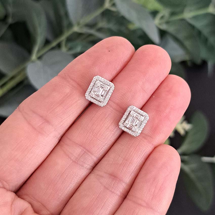 Baguette and Brilliant Cut Illusion Set Diamond Cluster Stud Earrings, set with 0.56 carats of multi cut diamonds in 18ct white gold