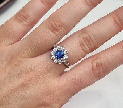 Art-Deco style sapphire and diamond cluster engagement ring in platinum