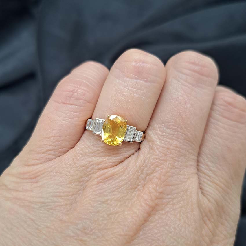 2.41ct Oval Cut Yellow Sapphire Engagement Ring with Baguette Diamond Shoulders in 18ct Yellow Gold