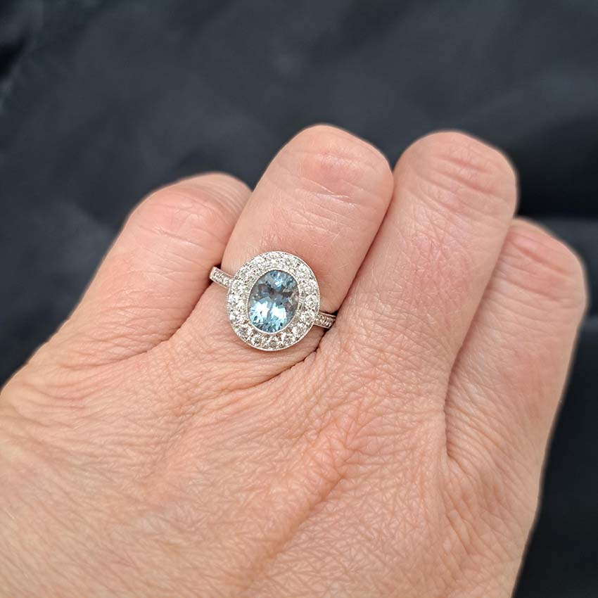 1.17ct Oval Cut Aquamarine and Diamond Cluster Engagement Ring in 18ct White Gold