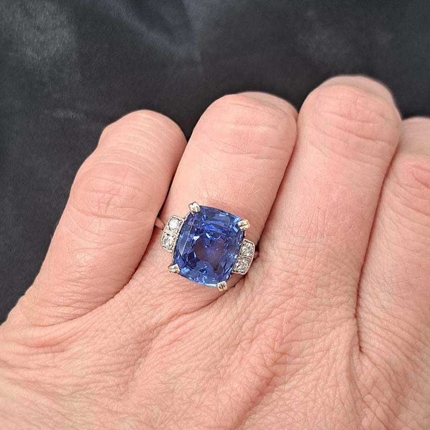Vintage Sapphire and diamond engagement ring, cushion shape 7 carat diamond shoulders on the finger image