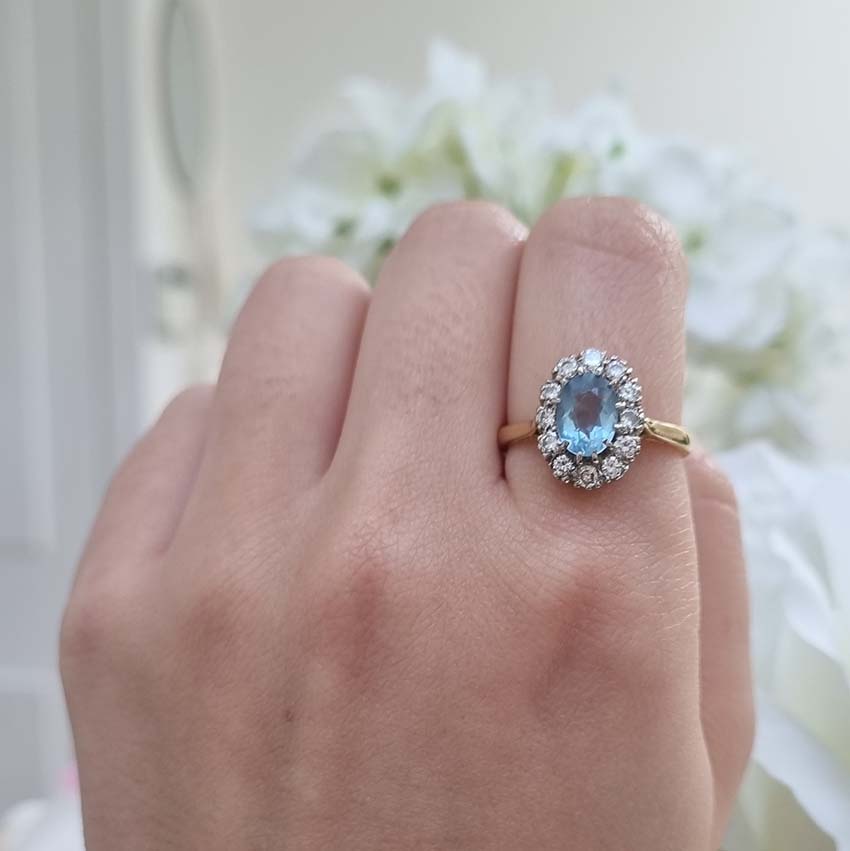 Vintage Oval Aquamarine and Diamond Cluster Ring