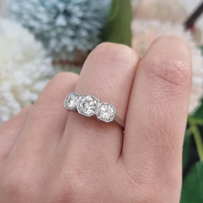 Three Stone Diamond Engagement Ring in Platinum, 1.25 carat timeless diamond trilogy ring set with three sparkling diamonds in octagonal platinum settings