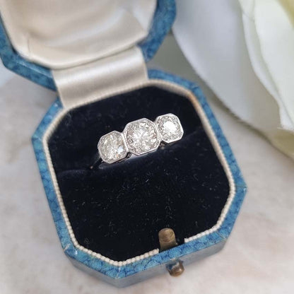 Three Stone Diamond Engagement Ring in Platinum, 1.25 carat timeless diamond trilogy ring set with three sparkling diamonds in octagonal platinum settings