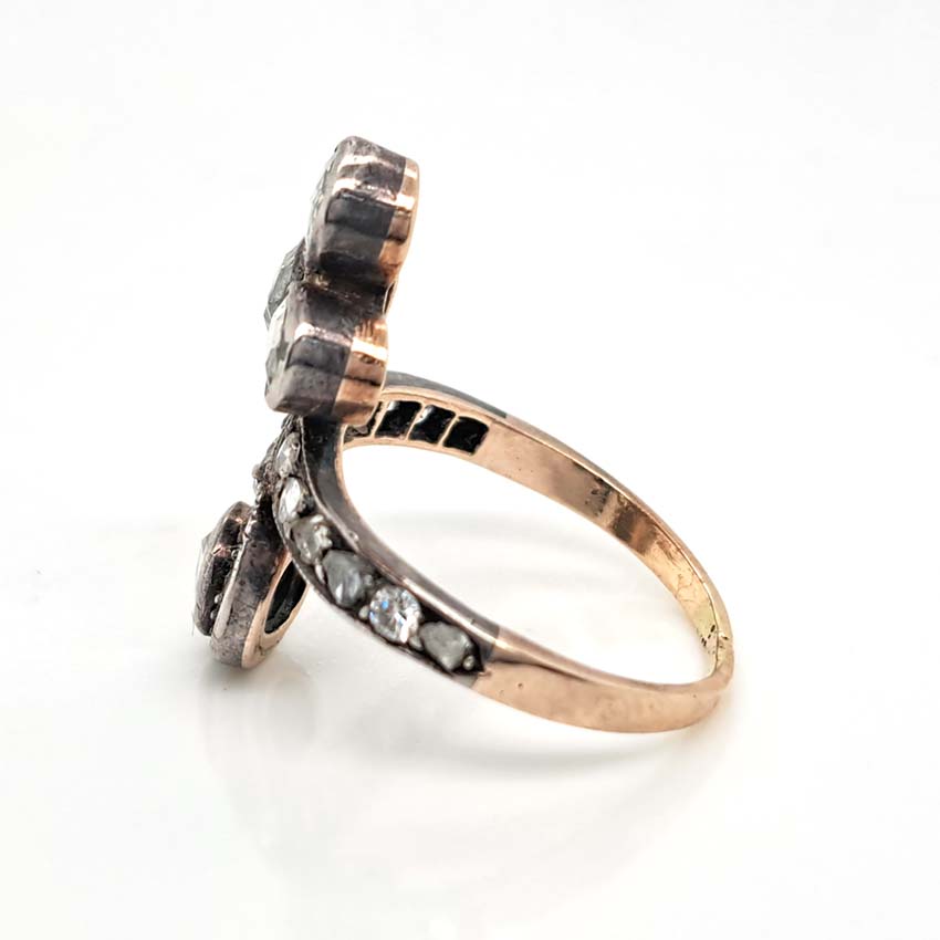 Antique Belle Epoque 1.35ct Rose Cut Diamond Ring, fleur-de-lis triple rose-cut diamond top and single rose-cut diamond solitaire bottom connected via diamond shoulders in silver upon yellow gold