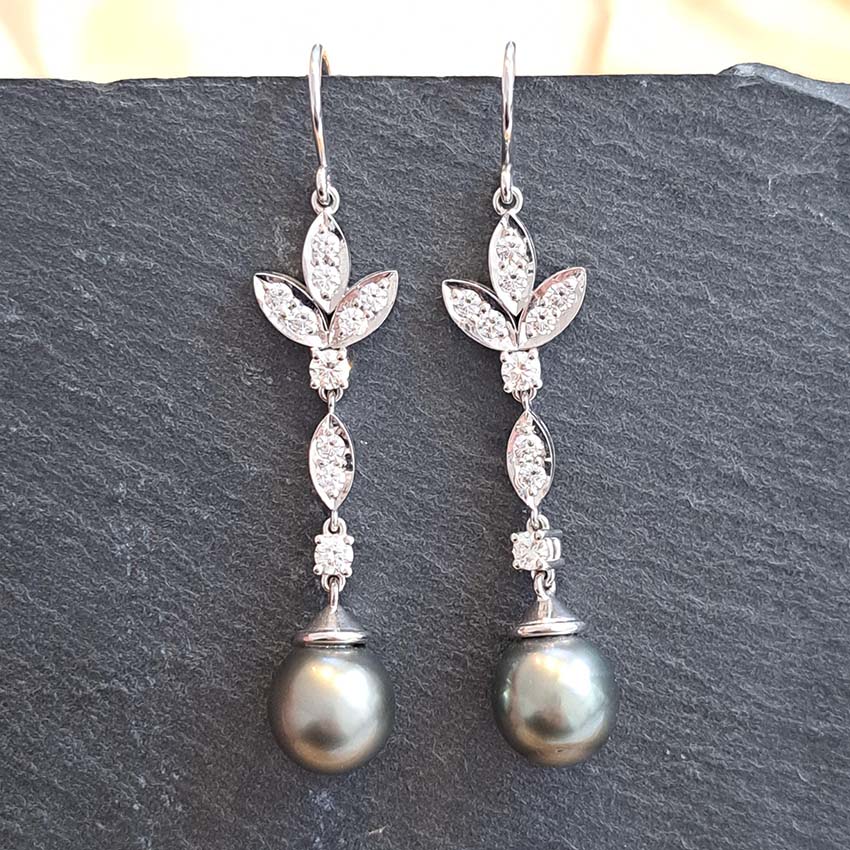 Grey Pearl and Diamond Drop Earrings, grey pearls with silver undertones suspended from diamond drops to diamond-set fleur-de-lis tops in 18ct white gold