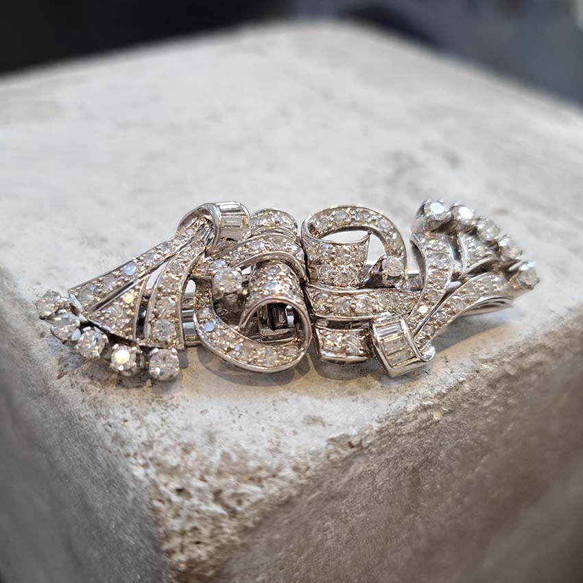 Art Deco 2.4ct Diamond Double Clip Brooch, geometric scrolled design set with 2.40 carats of single-cut, eight-cut and baguette-cut diamonds in platinum to later 14ct white gold pin