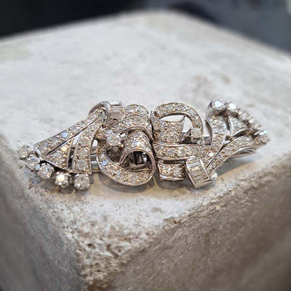 Art Deco 2.4ct Diamond Double Clip Brooch, geometric scrolled design set with 2.40 carats of single-cut, eight-cut and baguette-cut diamonds in platinum to later 14ct white gold pin