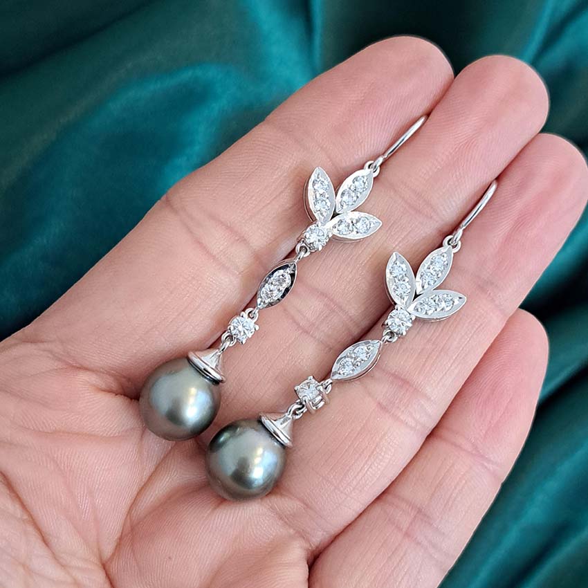 Grey Pearl and Diamond Drop Earrings, grey pearls with silver undertones suspended from diamond drops to diamond-set fleur-de-lis tops in 18ct white gold