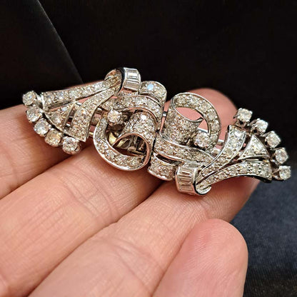 Art Deco 2.4ct Diamond Double Clip Brooch, geometric scrolled design set with 2.40 carats of single-cut, eight-cut and baguette-cut diamonds in platinum to later 14ct white gold pin