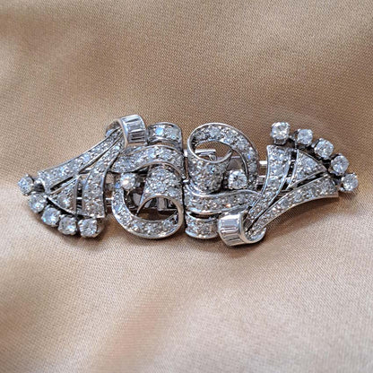 Art Deco 2.4ct Diamond Double Clip Brooch, geometric scrolled design set with 2.40 carats of single-cut, eight-cut and baguette-cut diamonds in platinum to later 14ct white gold pin