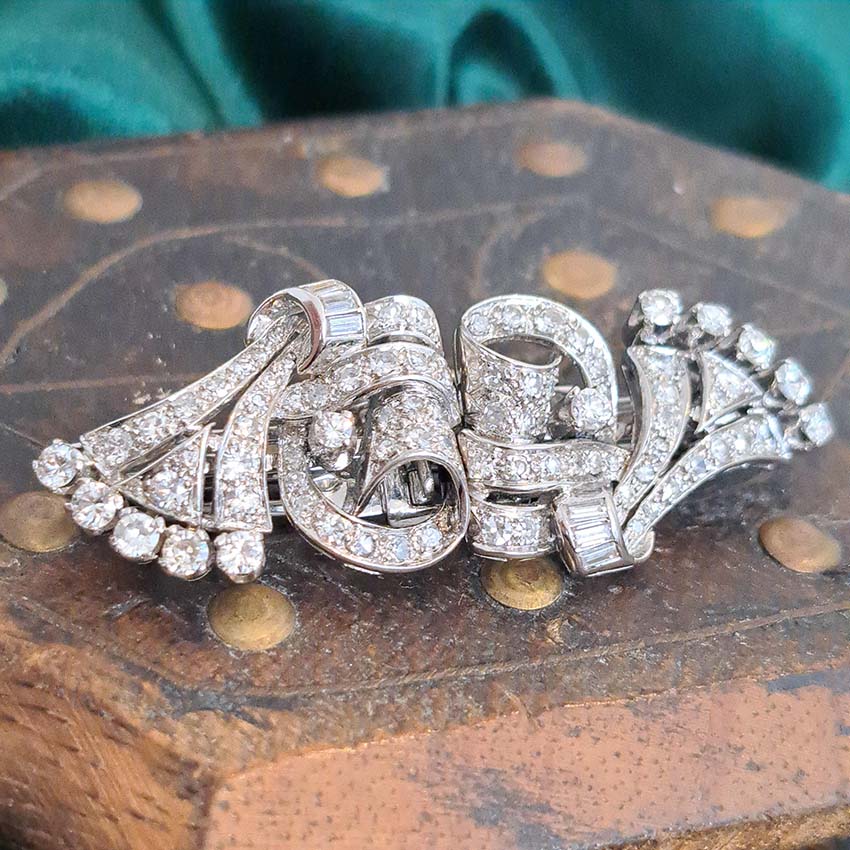 Art Deco 2.4ct Diamond Double Clip Brooch, geometric scrolled design set with 2.40 carats of single-cut, eight-cut and baguette-cut diamonds in platinum to later 14ct white gold pin