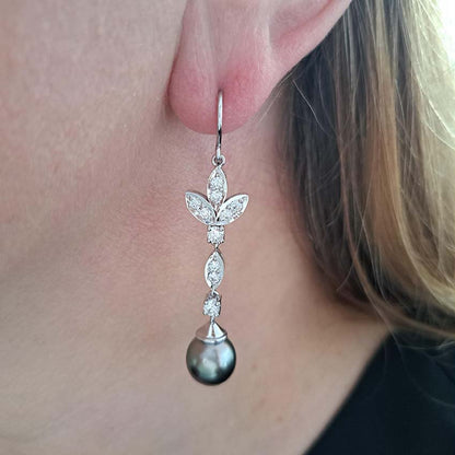 Grey Pearl and Diamond Drop Earrings, grey pearls with silver undertones suspended from diamond drops to diamond-set fleur-de-lis tops in 18ct white gold