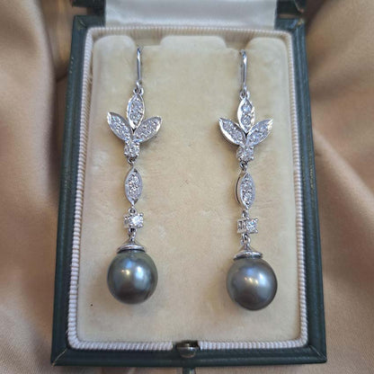 Grey Pearl and Diamond Drop Earrings, grey pearls with silver undertones suspended from diamond drops to diamond-set fleur-de-lis tops in 18ct white gold
