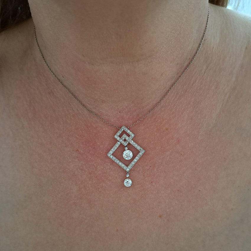 Art Deco 3.5ct Old Cut Diamond Pendant in Platinum, 3.50 carats of old European transitional cut diamonds set in entwined oblique squares. Circa 1920s