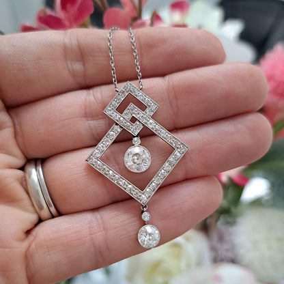 Art Deco 3.5ct Old Cut Diamond Pendant in Platinum, 3.50 carats of old European transitional cut diamonds set in entwined oblique squares. Circa 1920s