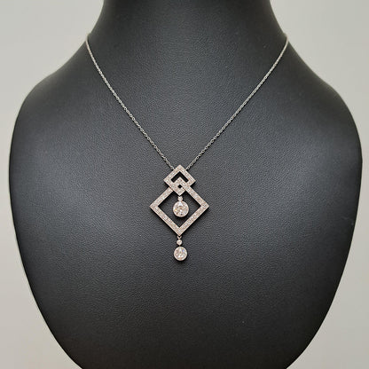 Art Deco 3.5ct Old Cut Diamond Pendant in Platinum, 3.50 carats of old European transitional cut diamonds set in entwined oblique squares. Circa 1920s
