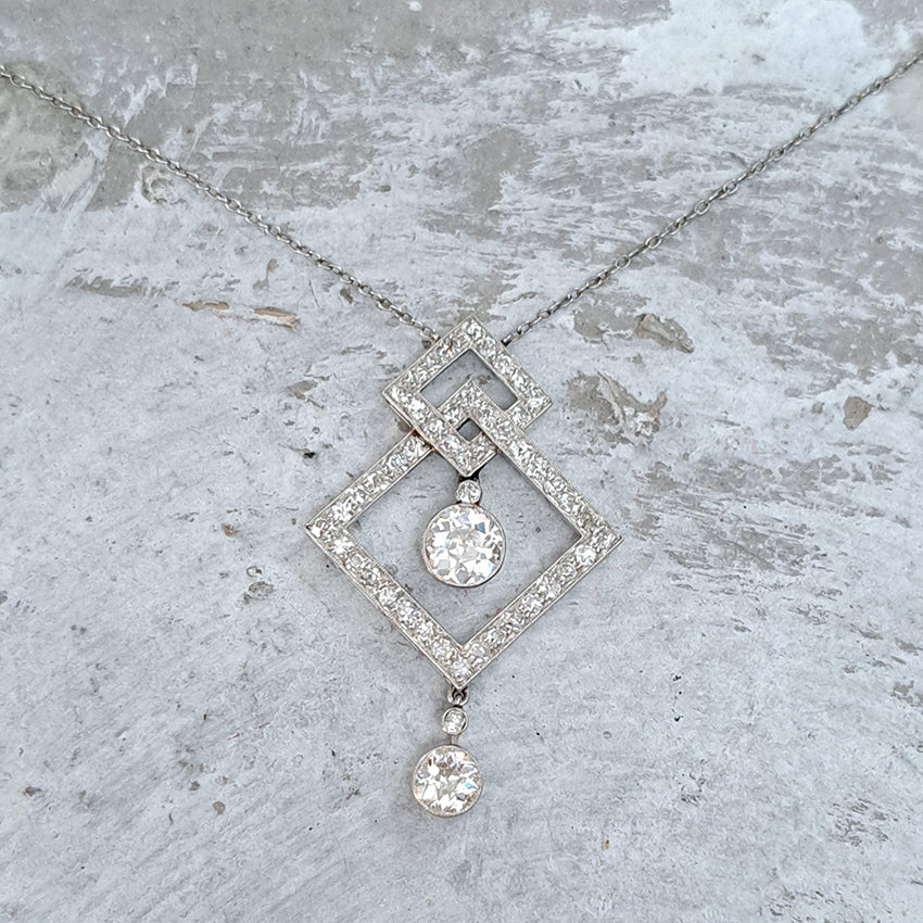 Art Deco 3.5ct Old Cut Diamond Pendant in Platinum, 3.50 carats of old European transitional cut diamonds set in entwined oblique squares. Circa 1920s