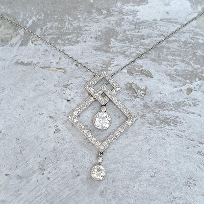 Art Deco 3.5ct Old Cut Diamond Pendant in Platinum, 3.50 carats of old European transitional cut diamonds set in entwined oblique squares. Circa 1920s