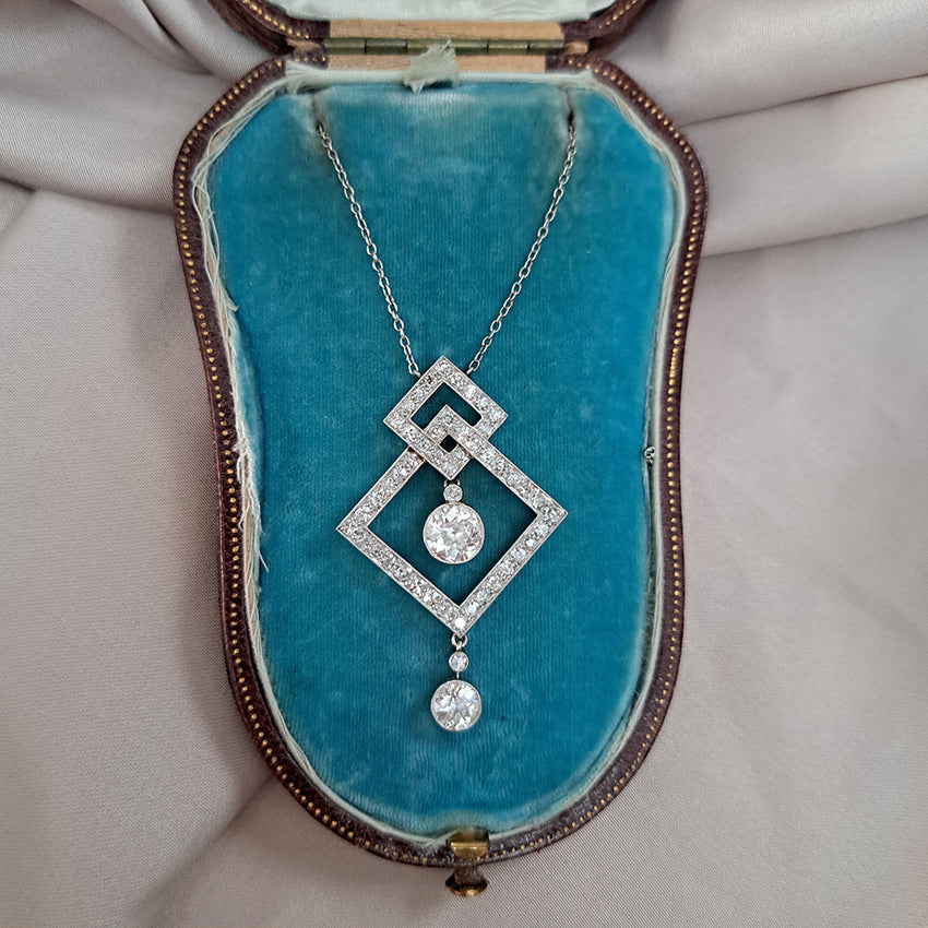 Art Deco 3.5ct Old Cut Diamond Pendant in Platinum, 3.50 carats of old European transitional cut diamonds set in entwined oblique squares. Circa 1920s