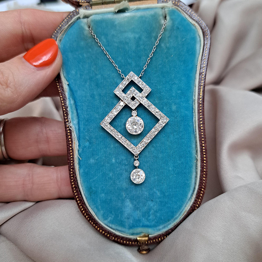 Art Deco 3.5ct Old Cut Diamond Pendant in Platinum, 3.50 carats of old European transitional cut diamonds set in entwined oblique squares. Circa 1920s