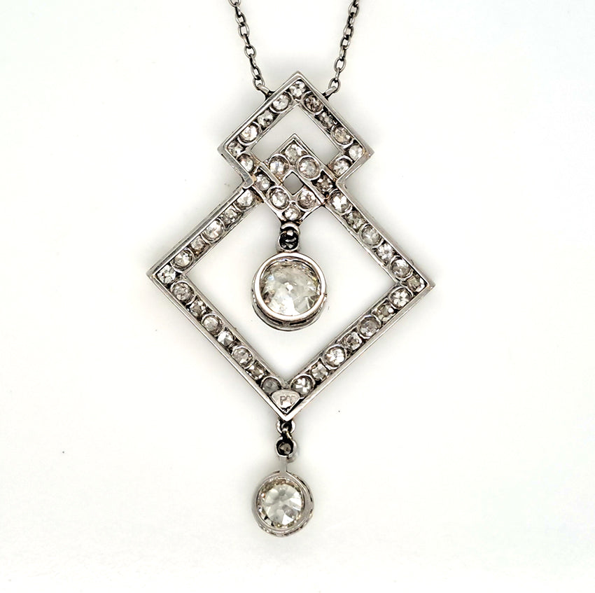 Art Deco 3.5ct Old Cut Diamond Pendant in Platinum, 3.50 carats of old European transitional cut diamonds set in entwined oblique squares. Circa 1920s