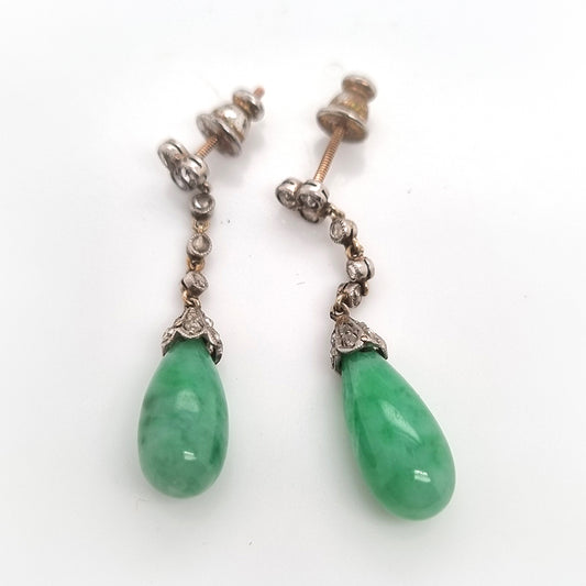 Antique Jadeite Jade and Diamond Drop Earrings, Rose cut diamond trefoil tops lead to three collets suspending diamond caps with apple jade pear drop pendants in platinum with millegrain detailing. Circa 1910