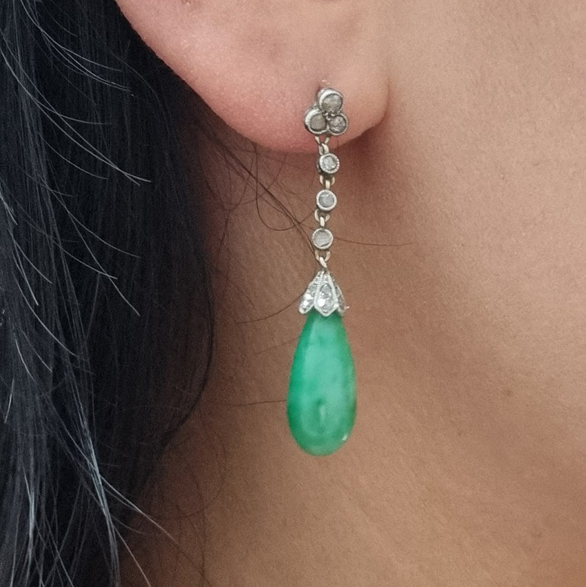 Antique Jadeite Jade and Diamond Drop Earrings, Rose cut diamond trefoil tops lead to three collets suspending diamond caps with apple jade pear drop pendants in platinum with millegrain detailing. Circa 1910