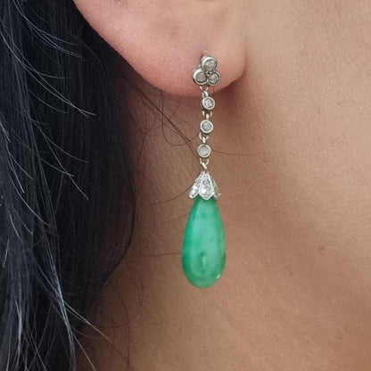 Antique Jadeite Jade and Diamond Drop Earrings, Rose cut diamond trefoil tops lead to three collets suspending diamond caps with apple jade pear drop pendants in platinum with millegrain detailing. Circa 1910