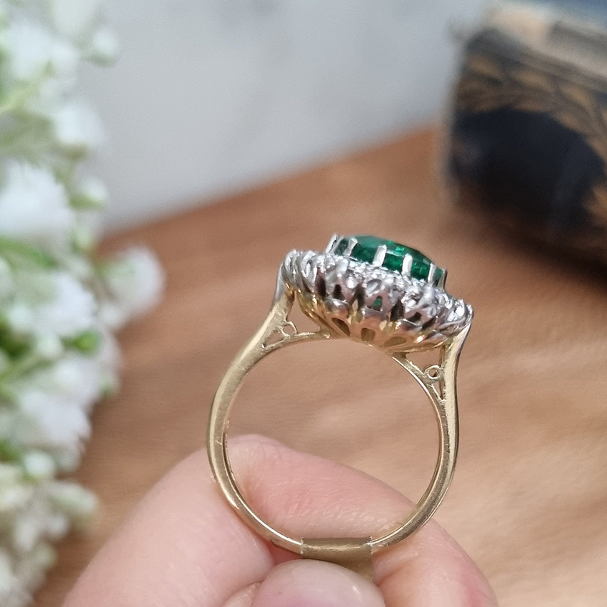 Vintage 2ct Emerald and Diamond Cluster Engagement Ring, 2ct cushion-cut emerald surrounded by 0.84cts round brilliant-cut diamonds in 18ct gold