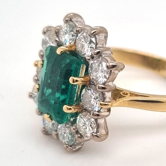 Vintage 2ct Emerald Cut Emerald and 1.50ct Diamond Cluster Engagement Ring in 18ct yellow gold