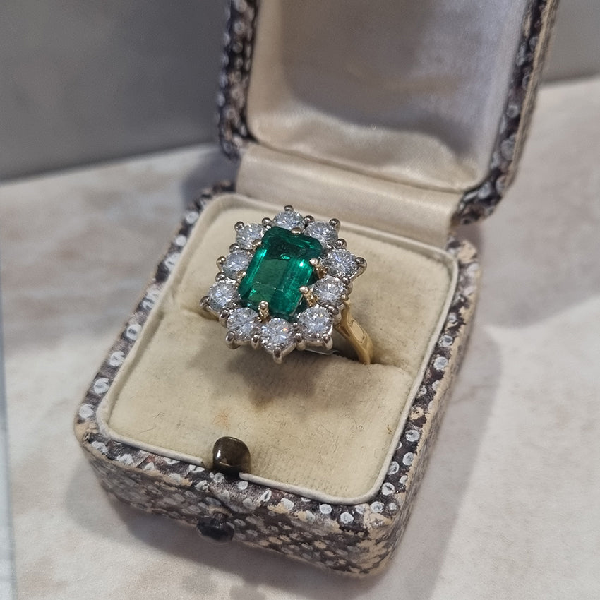Vintage 2ct Emerald Cut Emerald and 1.50ct Diamond Cluster Engagement Ring in 18ct yellow gold