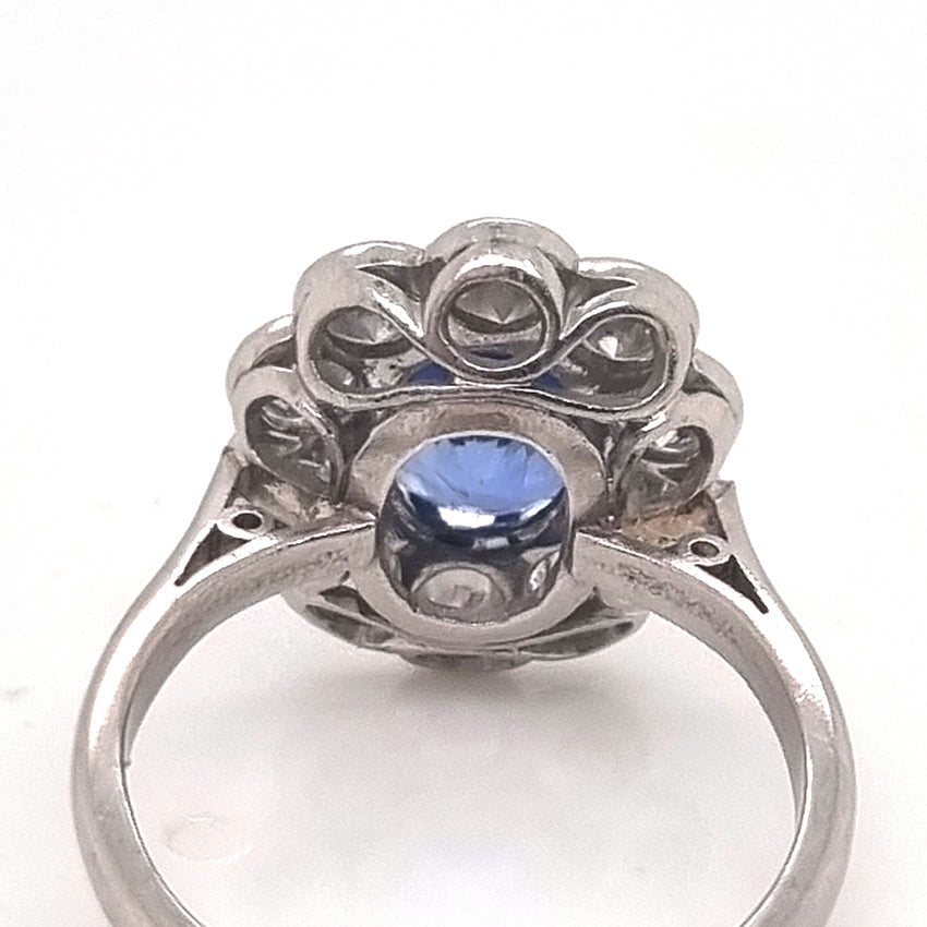 Vintage 2ct Cornflower Blue Sapphire and Diamond Flower Cluster Engagement Ring in Platinum