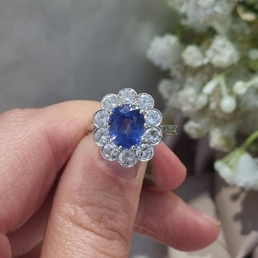 Vintage 2ct Cornflower Blue Sapphire and Diamond Floral Cluster Engagement Ring in Platinum