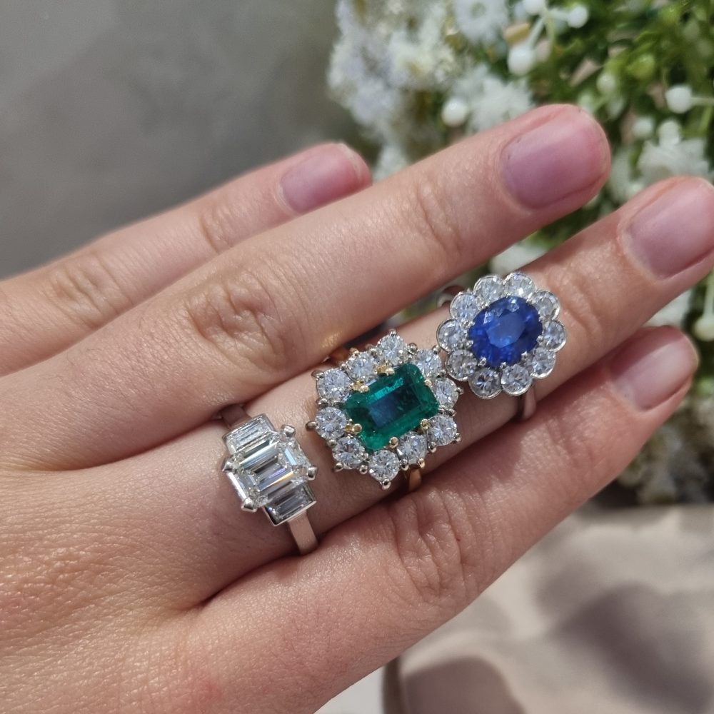 Vintage 2ct Emerald Cut Emerald and 1.50ct Diamond Cluster Engagement Ring in 18ct yellow gold