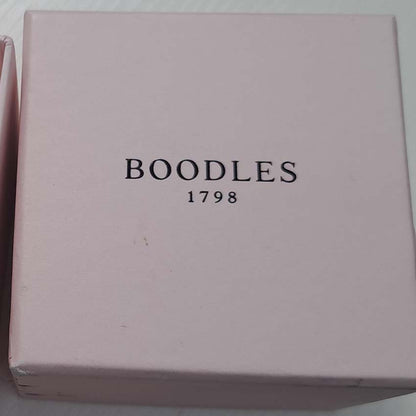 Boodles Waterfall Diamond Ring Classic Platinum, Inspired by the Raindance ring, the Waterfall ring features the iconic arrangement of diamond 'droplets' in an asymmetrical design over three bands which are then further accented with being set with smaller diamonds throughout