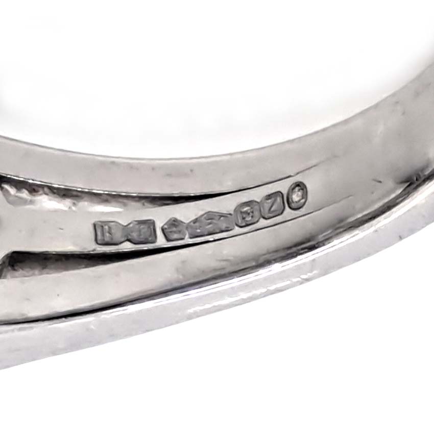 Boodles Waterfall Diamond Ring Classic Platinum, Inspired by the Raindance ring, the Waterfall ring features the iconic arrangement of diamond 'droplets' in an asymmetrical design over three bands which are then further accented with being set with smaller diamonds throughout