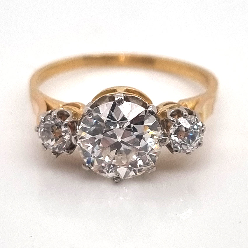 Art Deco French 1.81ct Old Cut Diamond Three Stone Engagement Ring, central 1.81ct F/G VS1 diamond flanked by smaller diamonds in platinum to 18ct yellow gold band