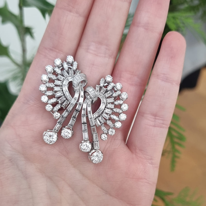 Carl Bucherer Vintage Diamond Spray Earrings in Platinum, set with sparkling brilliant, baguette and marquise-cut diamonds with post and clip fittings. Circa 1950s
