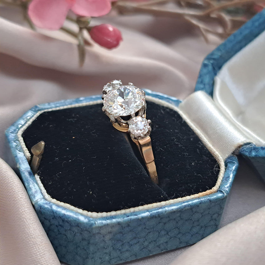 Art Deco French 1.81ct Old Cut Diamond Three Stone Engagement Ring, central 1.81ct F/G VS1 diamond flanked by smaller diamonds in platinum to 18ct yellow gold band